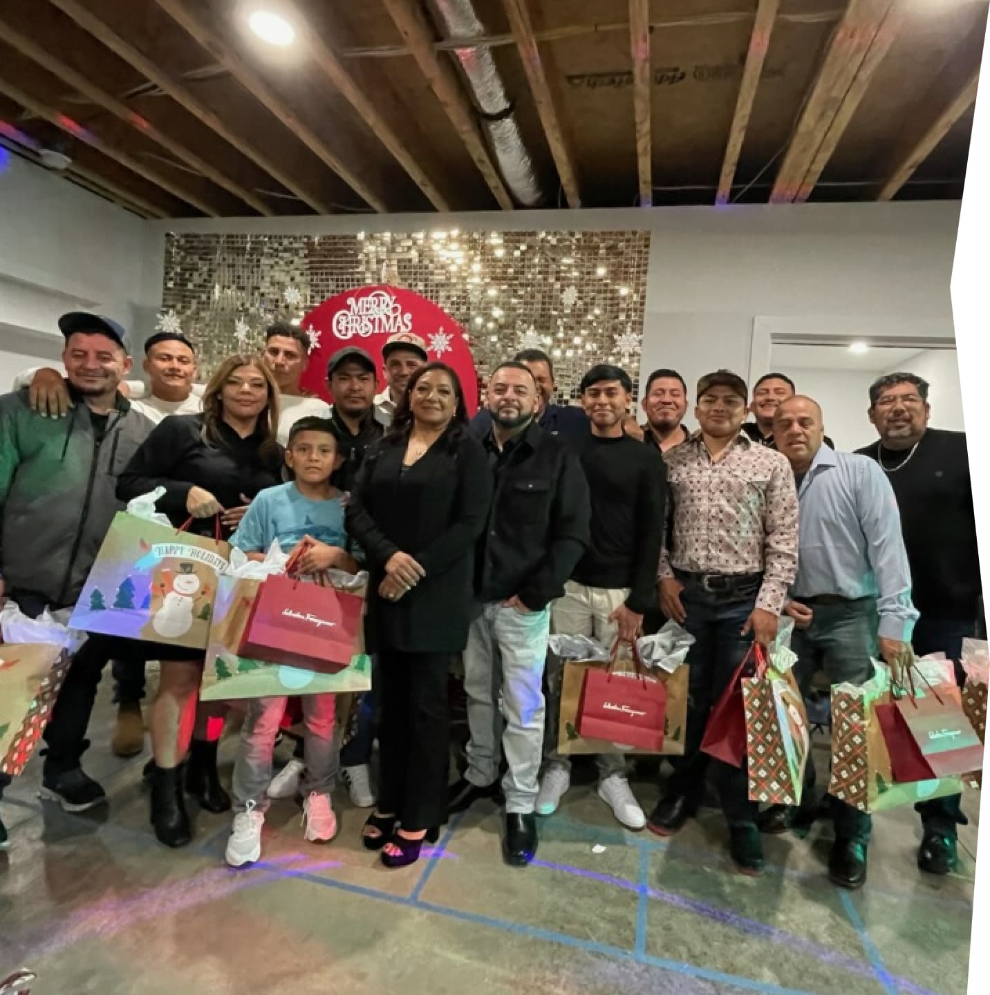 The Son Concrete LLC team together at the company Christmas gathering
